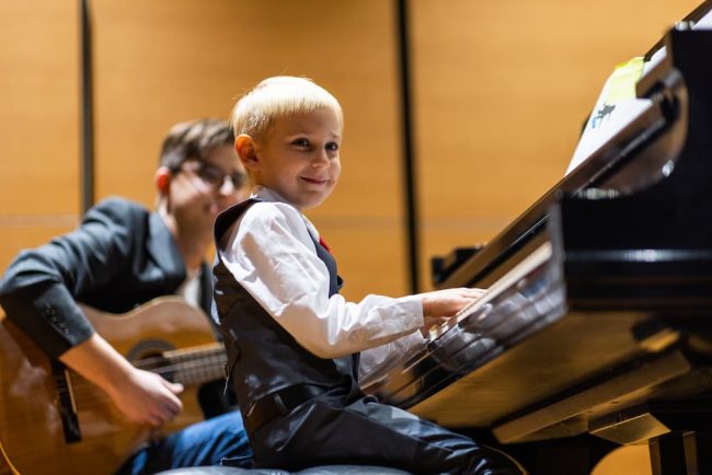 kid at piano recital