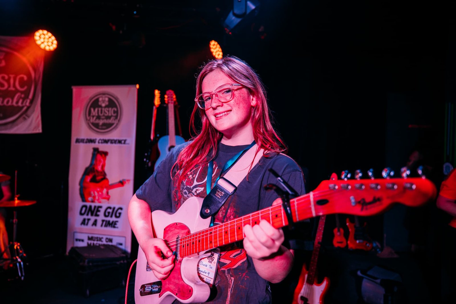 teenage on stage at a gig