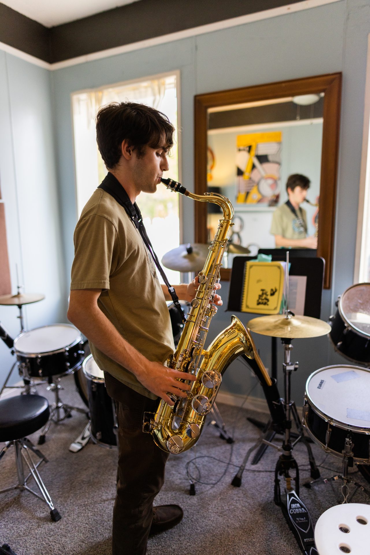 teenager playing saxophone