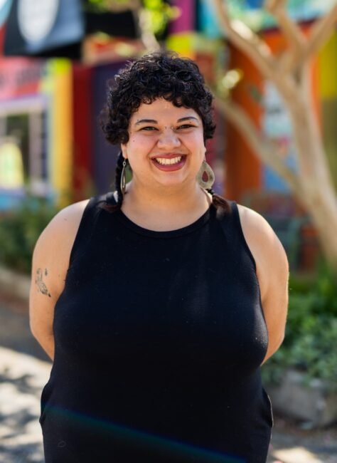 woman in front of building