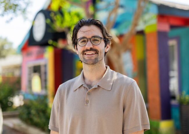 jack in front of a buildling