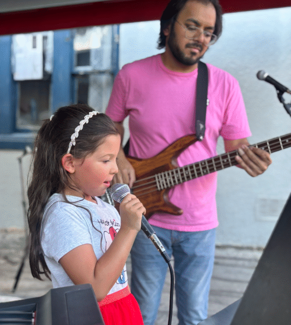 kid and guy singing